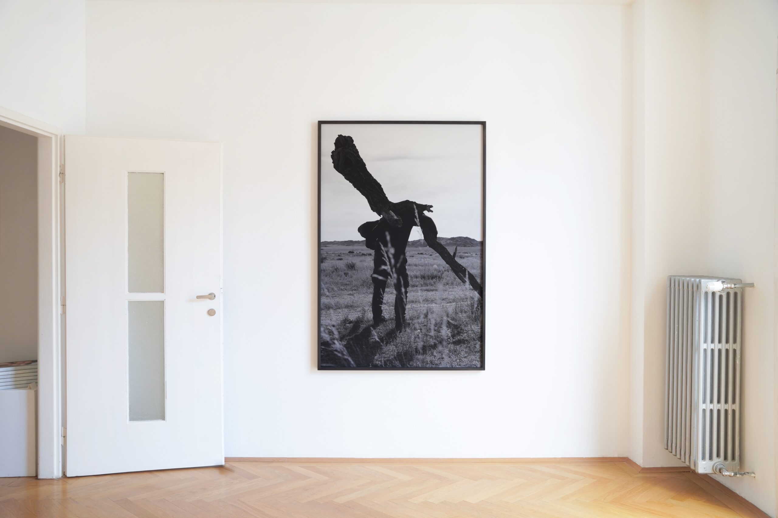 Ausstellungsansicht der Fotoarbeit "Dance or Struggle with Nature I", 2024, in der Ausstellung "Steppe Scape", 2025, im Vienna Collectors Club, Österreich